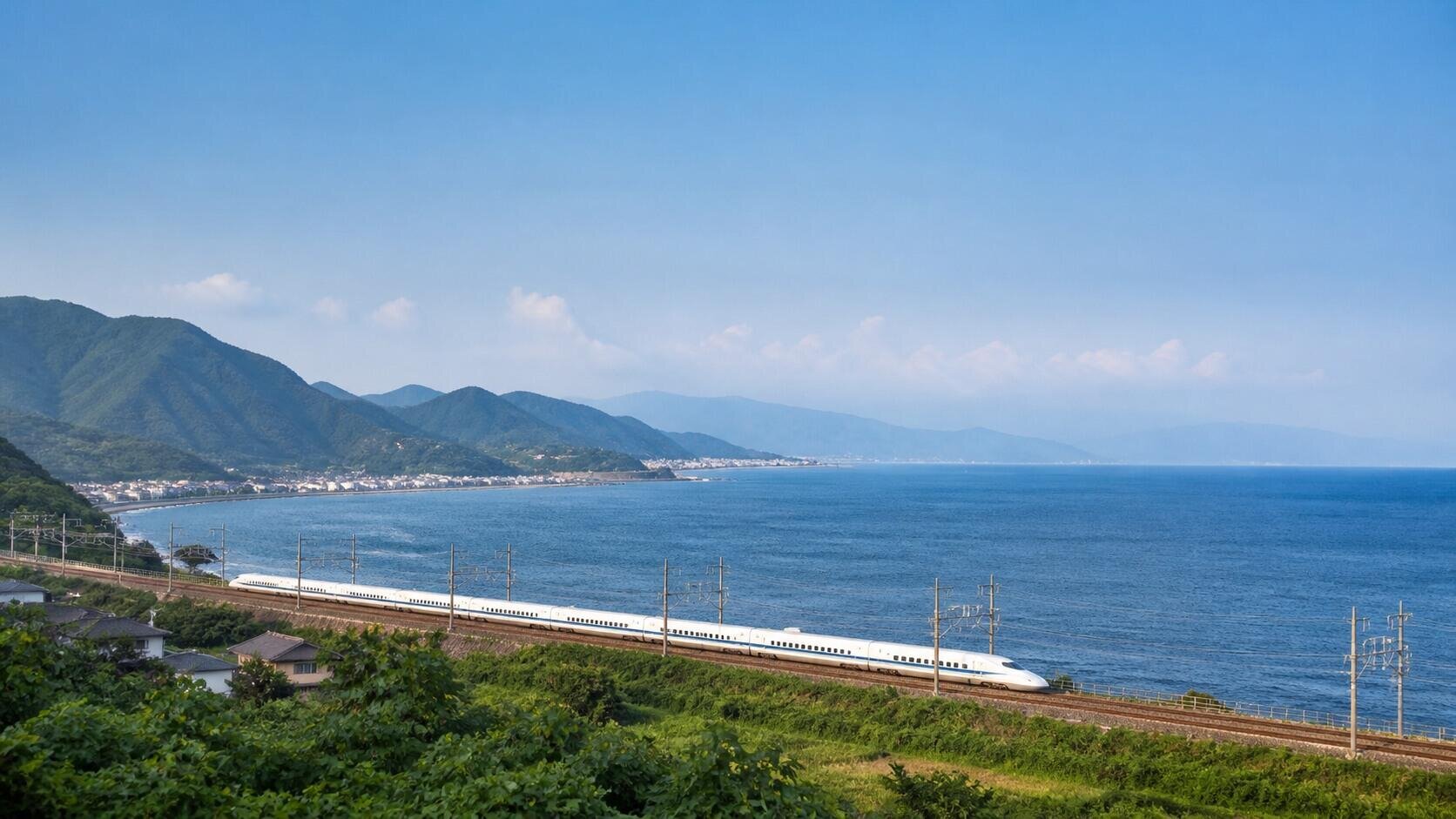 東京方面から小田原へ向かう海沿いの車窓イメージ